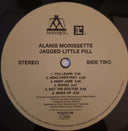 Jagged Little Pill | Mint (M) Mint (M)
