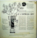 At A Sidewalk Cafe | Very Good Plus (VG+) Very Good Plus (VG+)