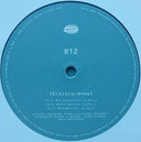 B12 - Electro-Soma | Mint (M) Mint (M)